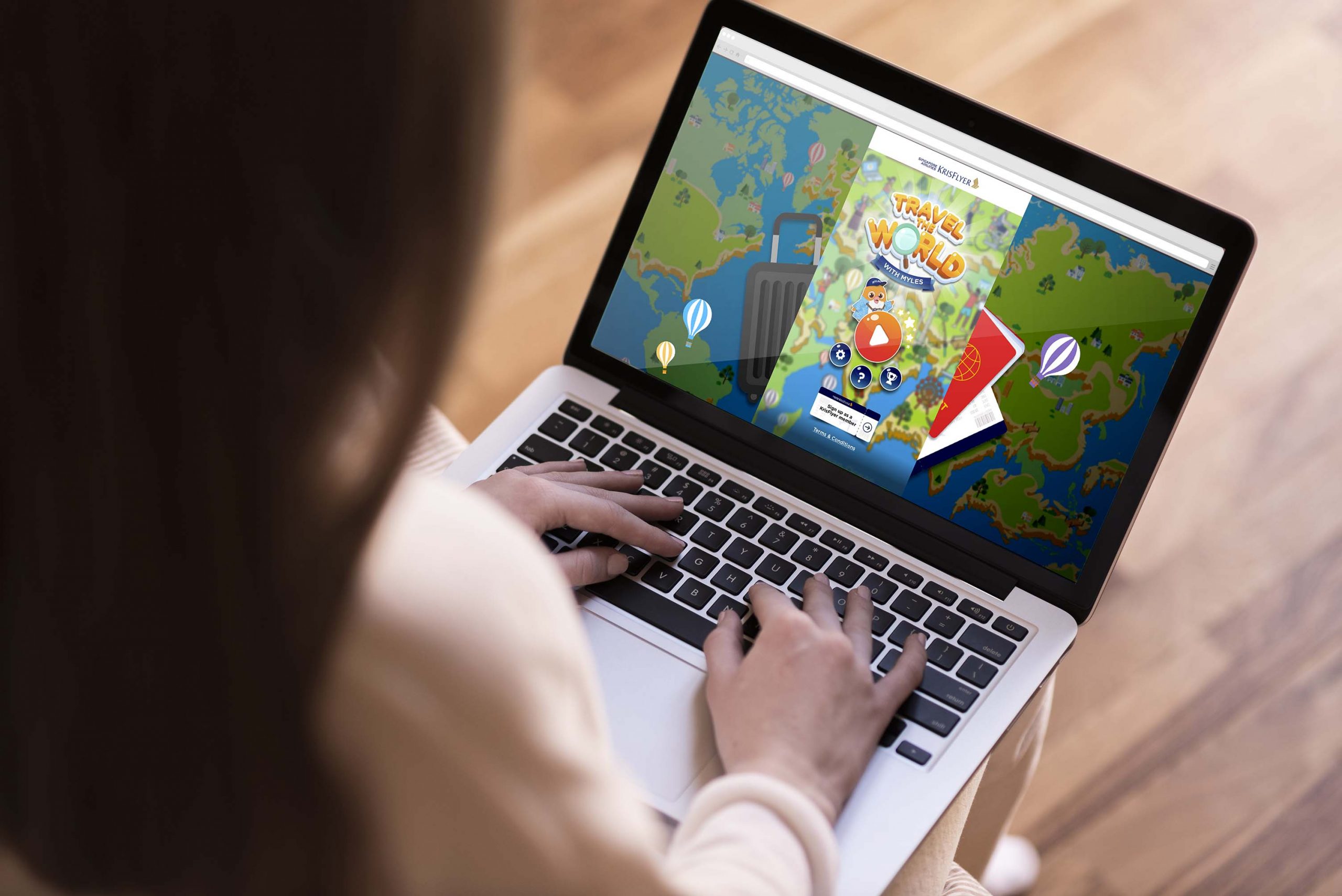 lady using laptop playing sia interactive microsite game